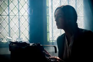 Writer at work on a typewriter