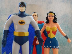 Action figures of Batman, Superman, and Wonder Woman