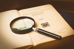 Magnifying glass on a book